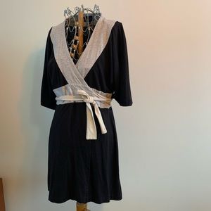 Black and white wrap dress. Size medium. Measurements in photos.